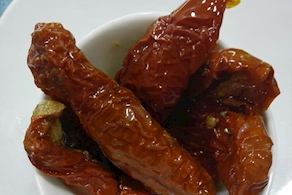 Tomàquet sec a l'oli (100g aprox)